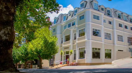 Flats Chateau Campos do Jordão Отели рядом с достопримечательностью «Casa - Chalé Condomínio Estância das Águas Claras»