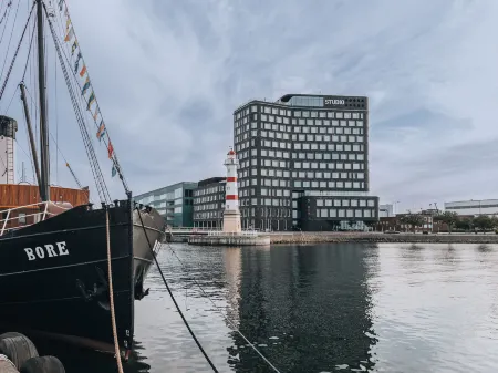 Story Hotel Studio Malmo Отели в г. Лома