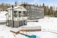 Aateli Lakeside Chalets - Former Vuokatti Suites Hotels in 