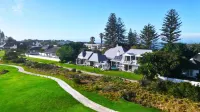 Mulligans Guest Lodge - موقف سيارات