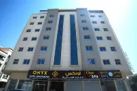 Onyx Hotel Apartments - Maha Hospitality Group Hôtels à proximité de : Al Zorah Beach