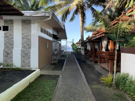 Villa MJ Maristela Beach Resort Отели рядом с достопримечательностью «Парк Тал»