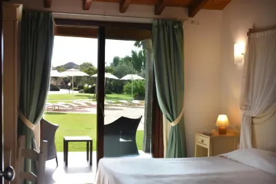 Le Anfore Hotel Отели рядом с достопримечательностью «Spiaggia di Punta Molentis»