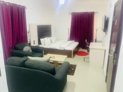 Eleventh House Hotel Hotels near Adamolekun Shopping complex and Estate