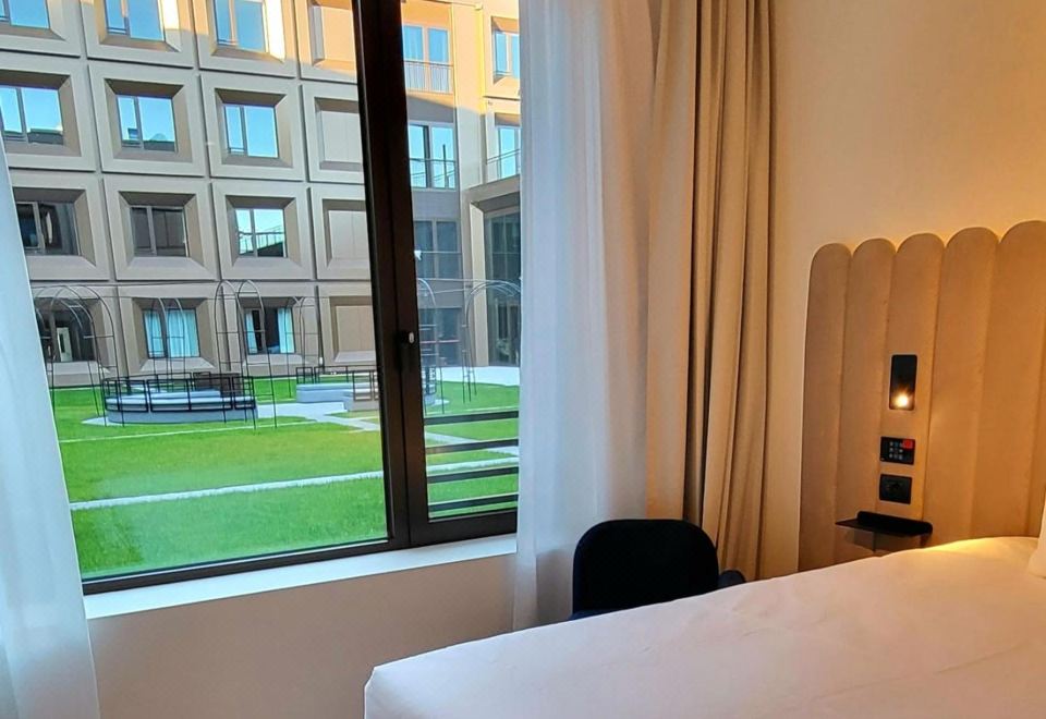 [트라이브 밀라노 말펜사의 현대적인 인테리어 모습]