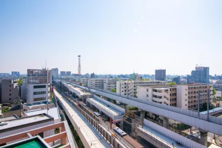 Vail Sta Takenotsuka Отели в г. Ясио