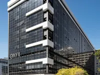 The Onyx Apartment Hotel by Newmark Hotels near Silo District