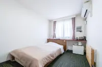 Business Hotel Nishine 하치만타이 호텔