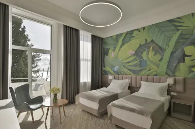 Garden Resort Отели рядом с достопримечательностью «Железнодорожный вокзал Гагра»