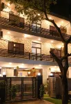 Amara Inn by Sandane Homes Near Expo Mart and Pari Chowk - 2-Star