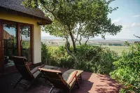Hitgeheim Country Lodge Hoteles en Sunland