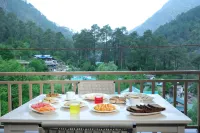 Ausnya Tirthan Hotels in Pekhri