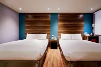 โรงแรมทูมอร์โรว์ - โรงแรมราคาถูก