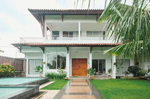 Villa Prambanan Jogja with Private Swimming Pool by Simply Homy - parking