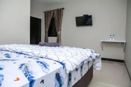 Saba Ayu Guest House Отели рядом с достопримечательностью «Taman Kupu-Kupu Cihanjuang»