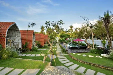 Kompyang Cottage Отели рядом с достопримечательностью «Giri Putri Cave»