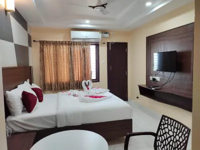 John Towers Hotels near Smart city,Green phase I ,Pioneer K.S Nagar Park