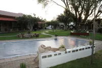 Potties Guesthouse โรงแรมใน