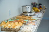 Hotel e Pousada Flor do Juá - breakfast