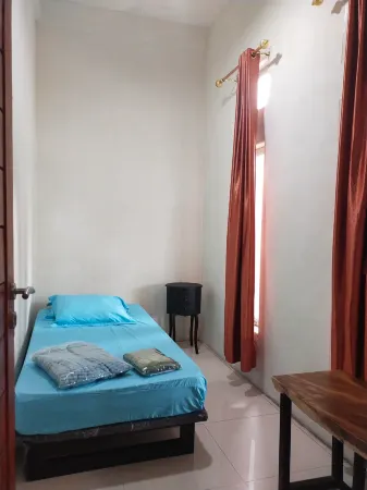 Rumah 4G Отели в г. Toba Regency