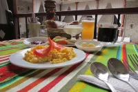Golden Rest Latacunga - servizio colazione