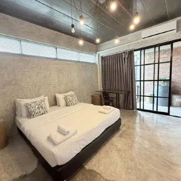 Rumpai Loft Habitat Отели рядом с достопримечательностью «Храм Рампэнг»