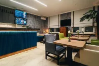 科羅納飯店 - 機場接送