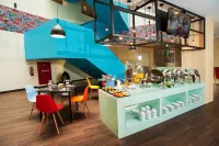 Idoop Hotel by Prasanthi - servizio colazione