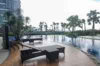 Best Price and Comfortable Living 2Br at Anderson Supermall Mansion Apartment by Travelio - Spor Salonu