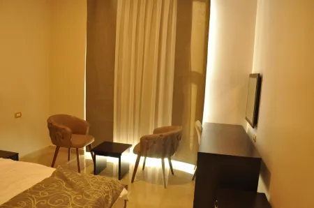 Panda Hotel Apartments Отели рядом с достопримечательностью «Мечеть короля Абдаллы I»