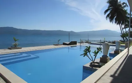 Mas Cottages Отели в г. Samosir Regency