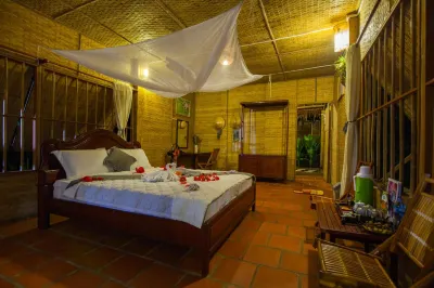 Mekong Ecolodge Bungalow 빈 롱 호텔