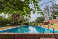 Leo Wooden Resort Hotels in Koppal