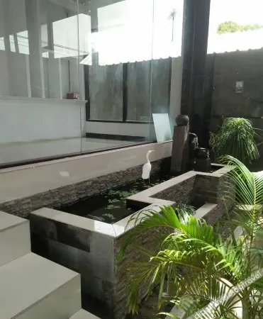 Ashofa Syariah Hotel Отели в г. Landasan Ulin Utara