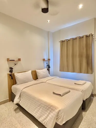 ห้องทวินวิวสวนสำหรับ 2 ท่าน พร้อมเตียงเดี่ยว 2 เตียง - ปลอดบุหรี่