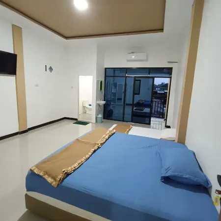 Homestay Gusar Отели в г. Pardomuan I