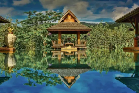 Howie's HomeStay Отели рядом с достопримечательностью «Bai Orchid and Butterfly Farm»