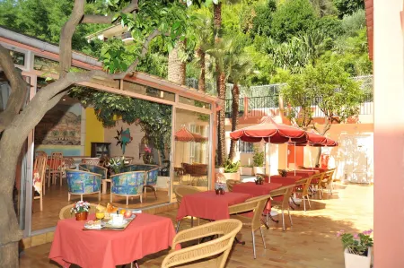 Hotel Menton Riviera Отели рядом с достопримечательностью «Валь Раме-Ментона Ботанический сад»