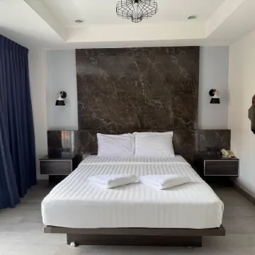 Jomtien Longstay Hotel Отели рядом с достопримечательностью «Массаж Смайл»