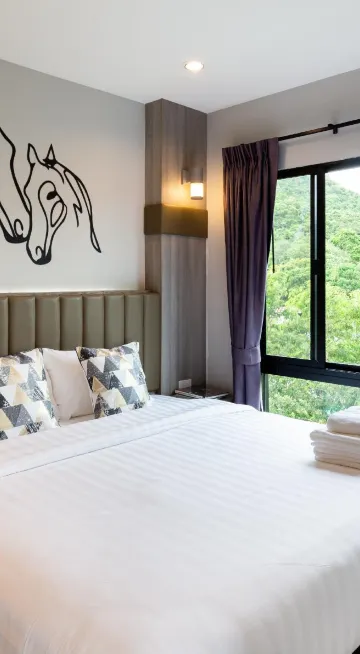 ห้องดีลักซ์พร้อมระเบียงและวิวภูเขา