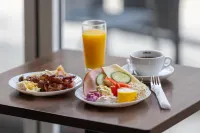 Cameo Boutique Hotell - breakfast