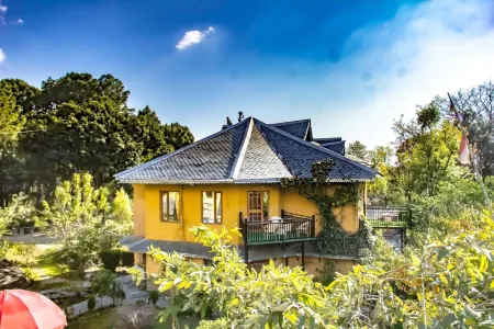 Prakriti Aalay - Riverside Mountain View Boutique Eco Resort Отели в г. Кангра