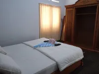 Mutiara Guest House Syariah - Parkplatz