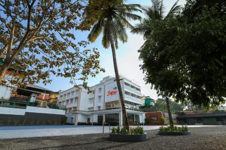 Hotel Saffron Wayanad Отели рядом с достопримечательностью «Little petals»