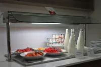 梅尼達Residence Inn 酒店 - 早餐
