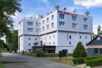 Hotel Acadie Eragny - Lemmikkieläimet sallittu