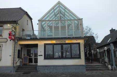 Pension Riverside in Leverkusen Hitdorf am Rhein - Zentral an der A1 Und 59 Отели в г. Леверкузен