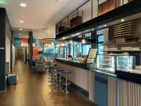 Meininger Hotel Frankfurt Main / Airport Отели рядом с достопримечательностью «Вестенд»