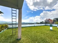 Red Chillies Nature Inn - Losmen