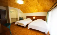Baiyulin Hotel (Aershan Railway Station Hot Spring Scenic Area) Hotels near A'er Shan Shi Dizhi Museum